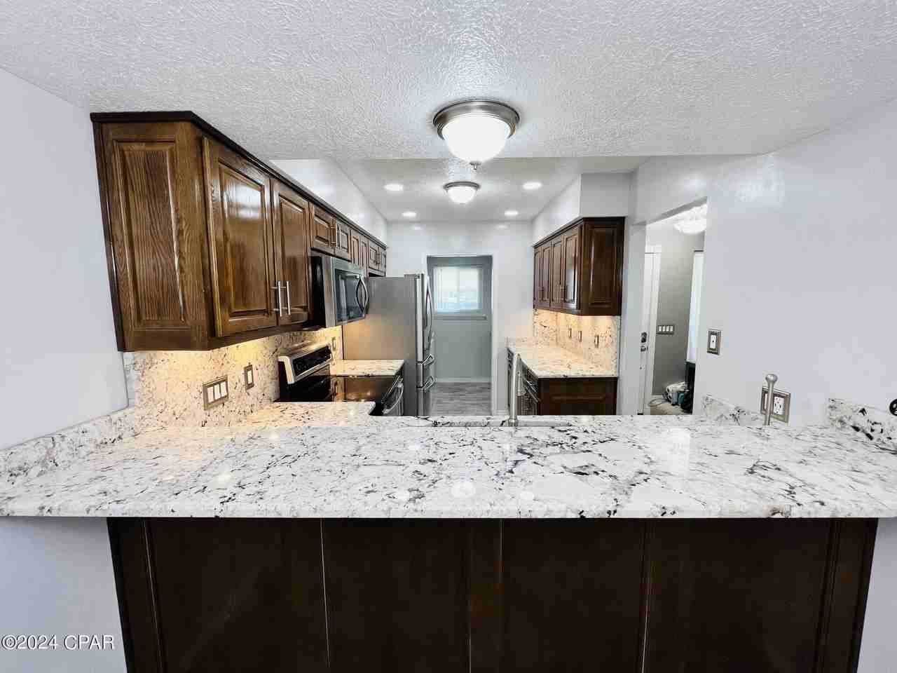 8623 N Lagoon Dr Unit B10 #B10 - Photo 6 of 30