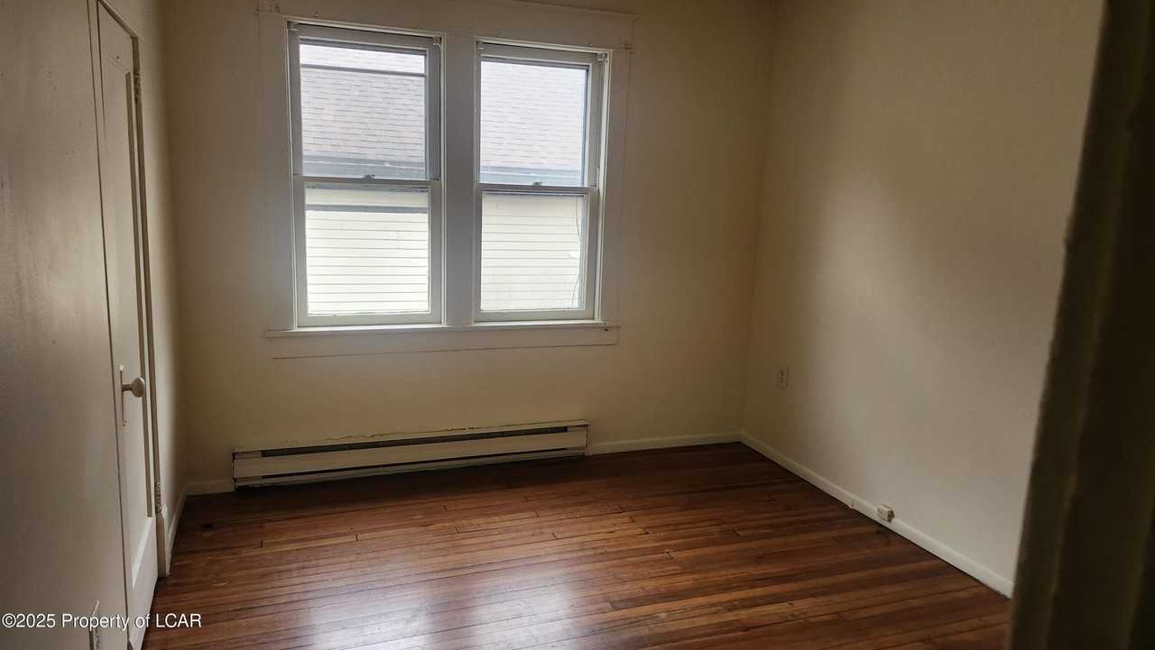 99 3rd Ave - Photo 3 of 8