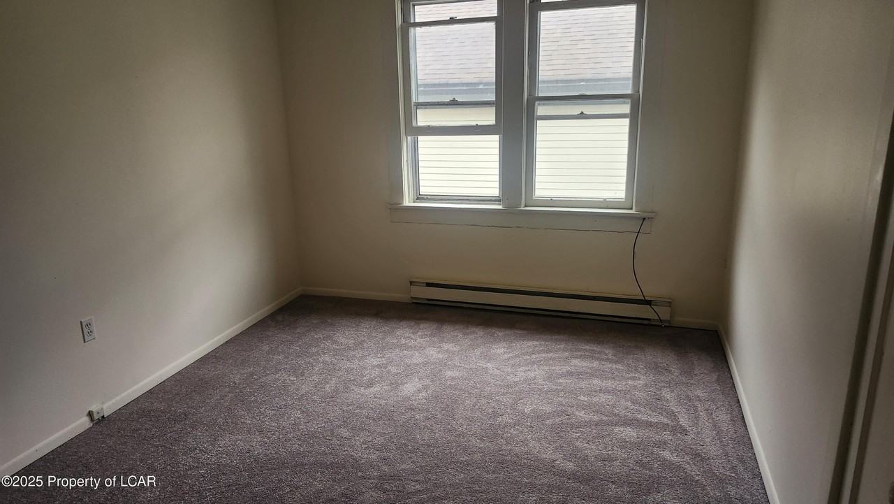 99 3rd Ave - Photo 5 of 8