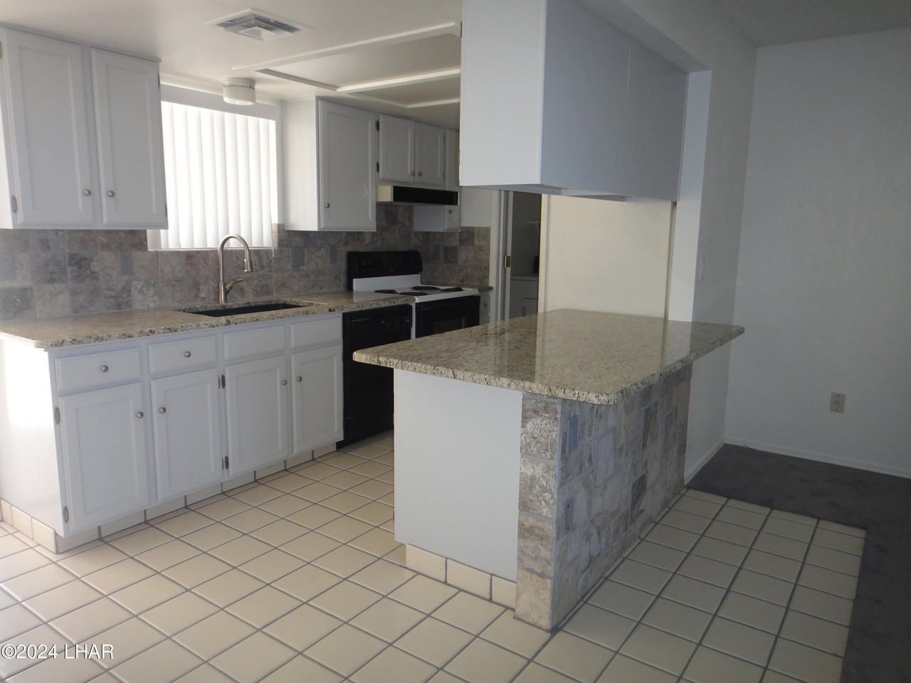 720 Mcculloch Boulevard South - Photo 4 of 18