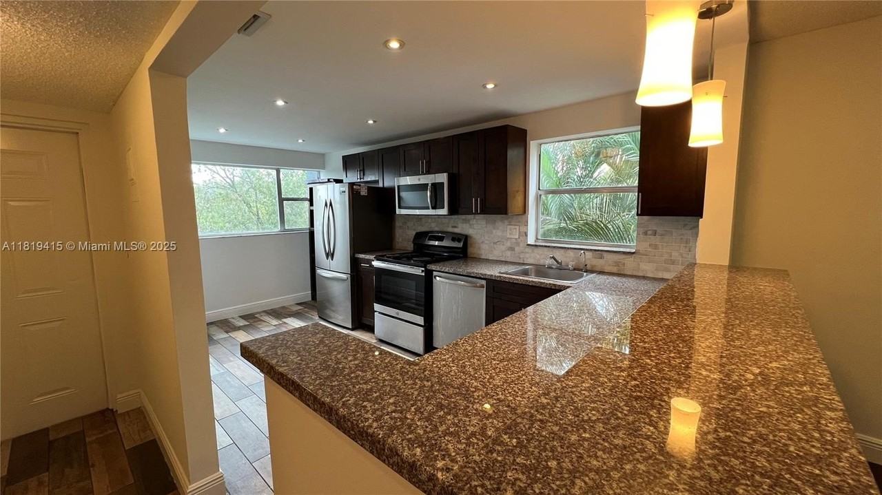 8300 Sands Point Blvd #K301 - Photo 4 of 24