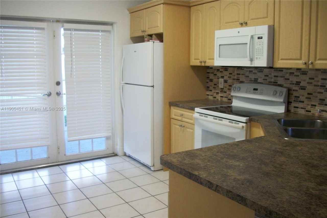 9307 Northwest 121st Street #77 - Photo 3 of 21