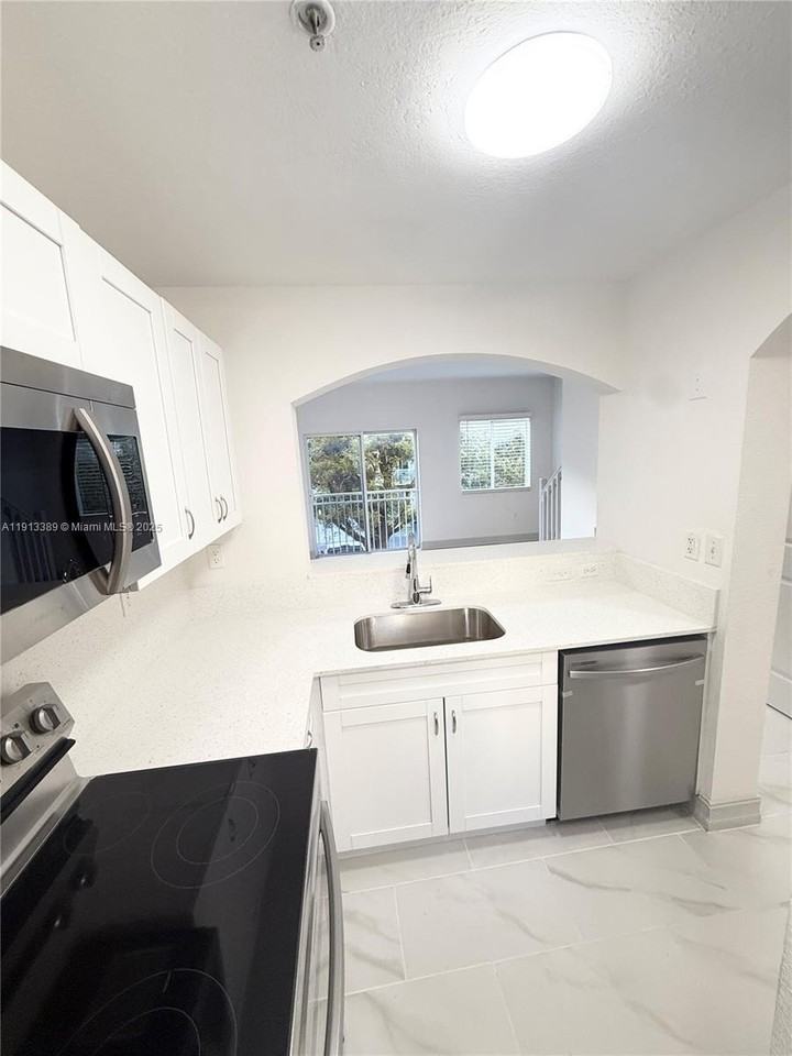 7991 Nw 8th St #113B - Photo 2 of 15