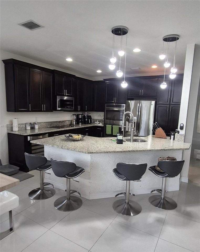 8760 Northwest 102nd Court - Photo 4 of 22