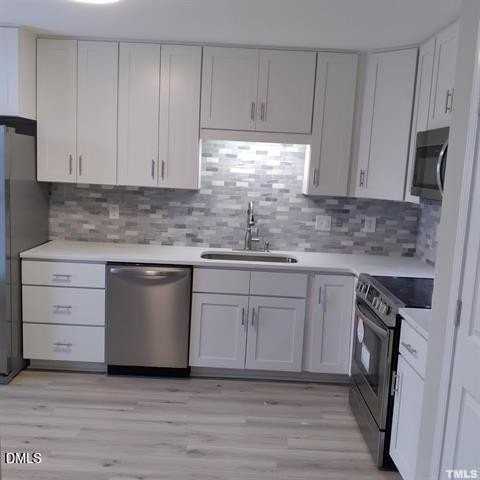 1015 Holmes St - Photo 4 of 12