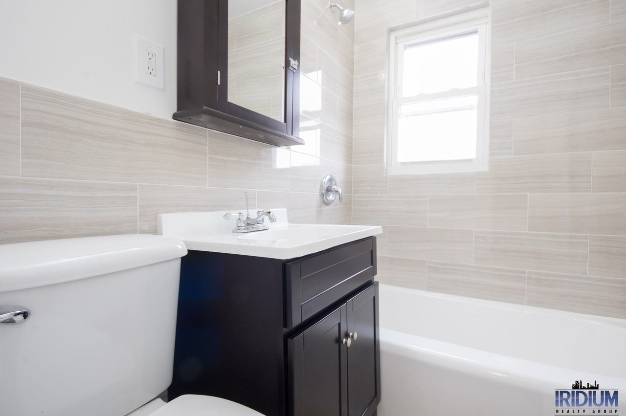 Spaxalaya 296 Harrison LLC - Photo 4 of 24