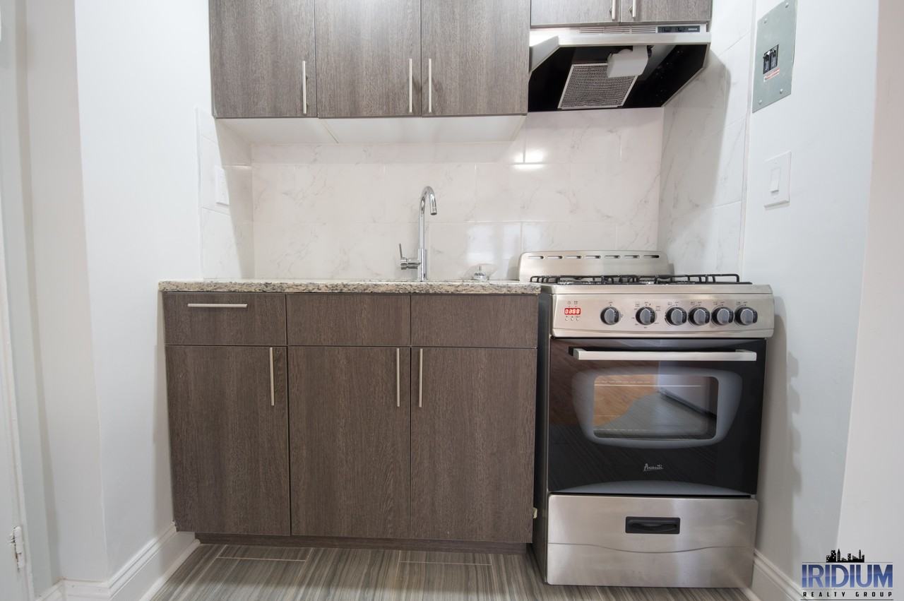 Spaxalaya 296 Harrison LLC - Photo 5 of 24