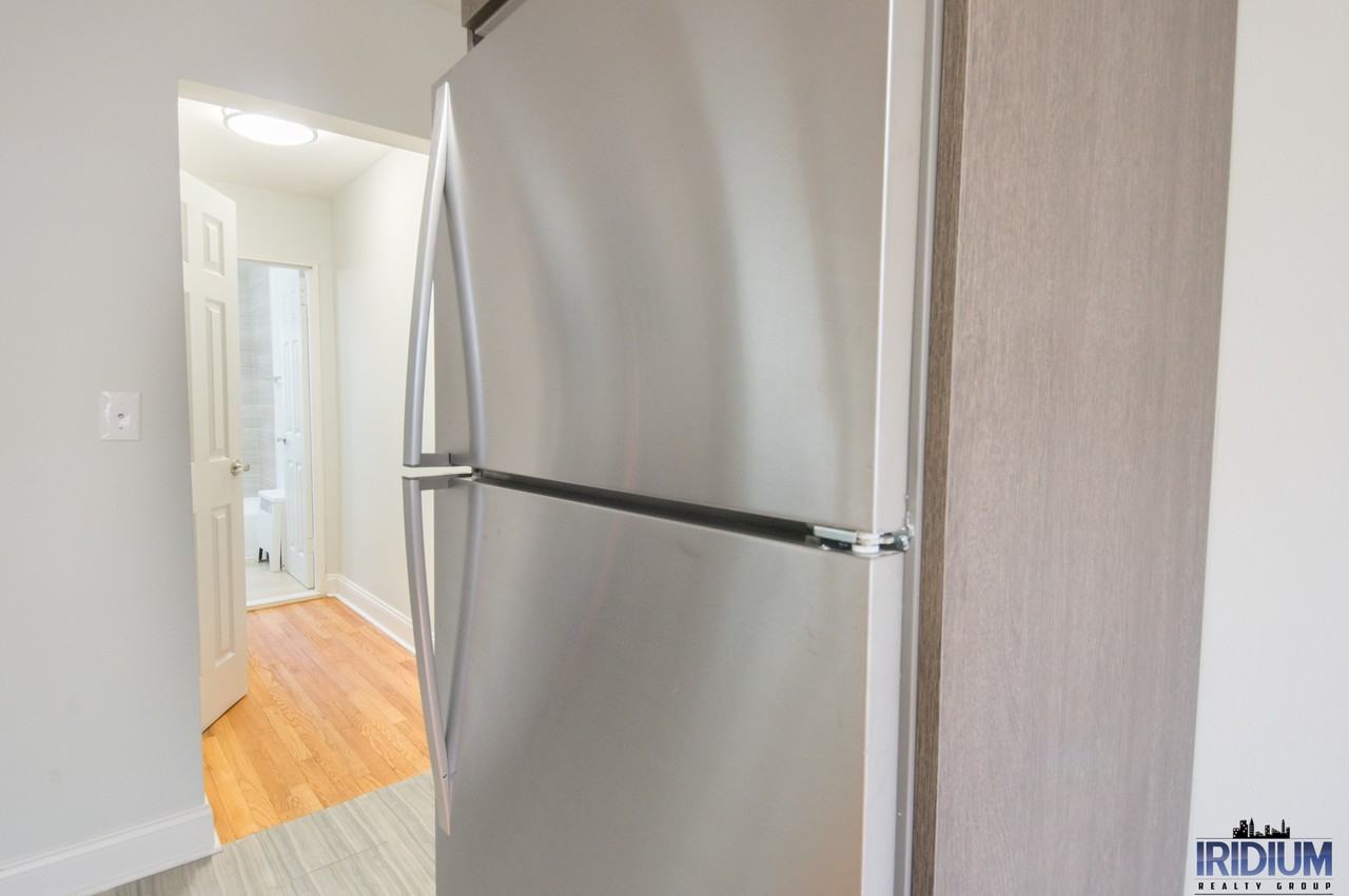 Spaxalaya 296 Harrison LLC - Photo 6 of 24