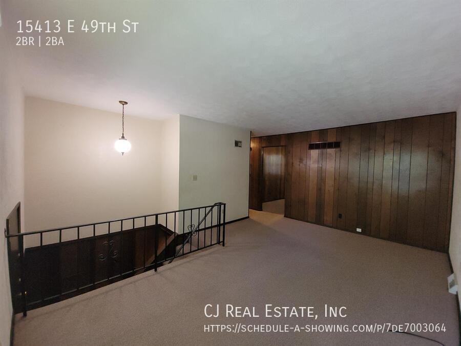15413 East 49th Street - Photo 2 of 11