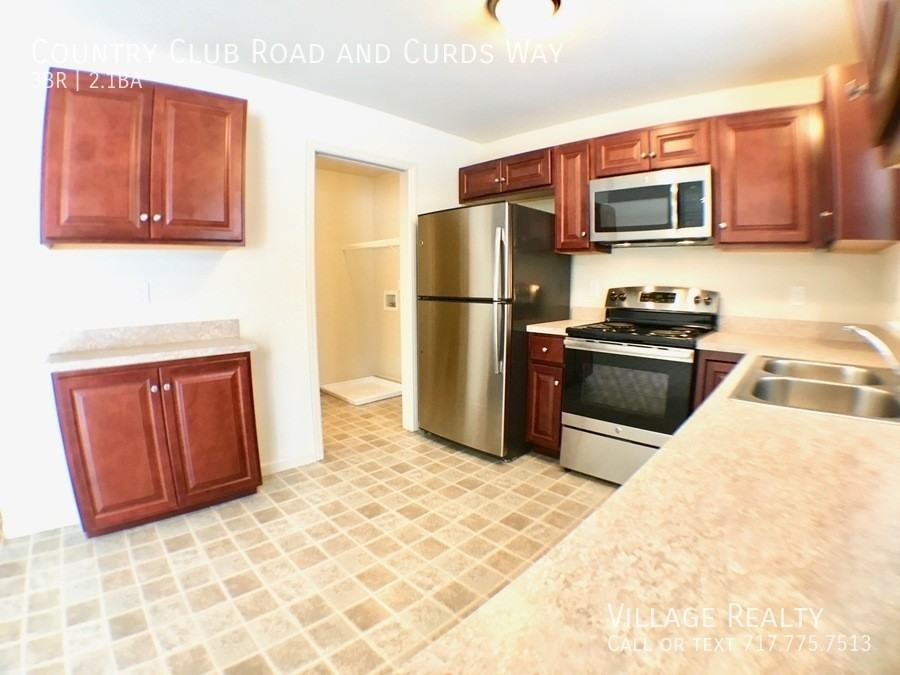 Country Club & Curds Way - Photo 2 of 24