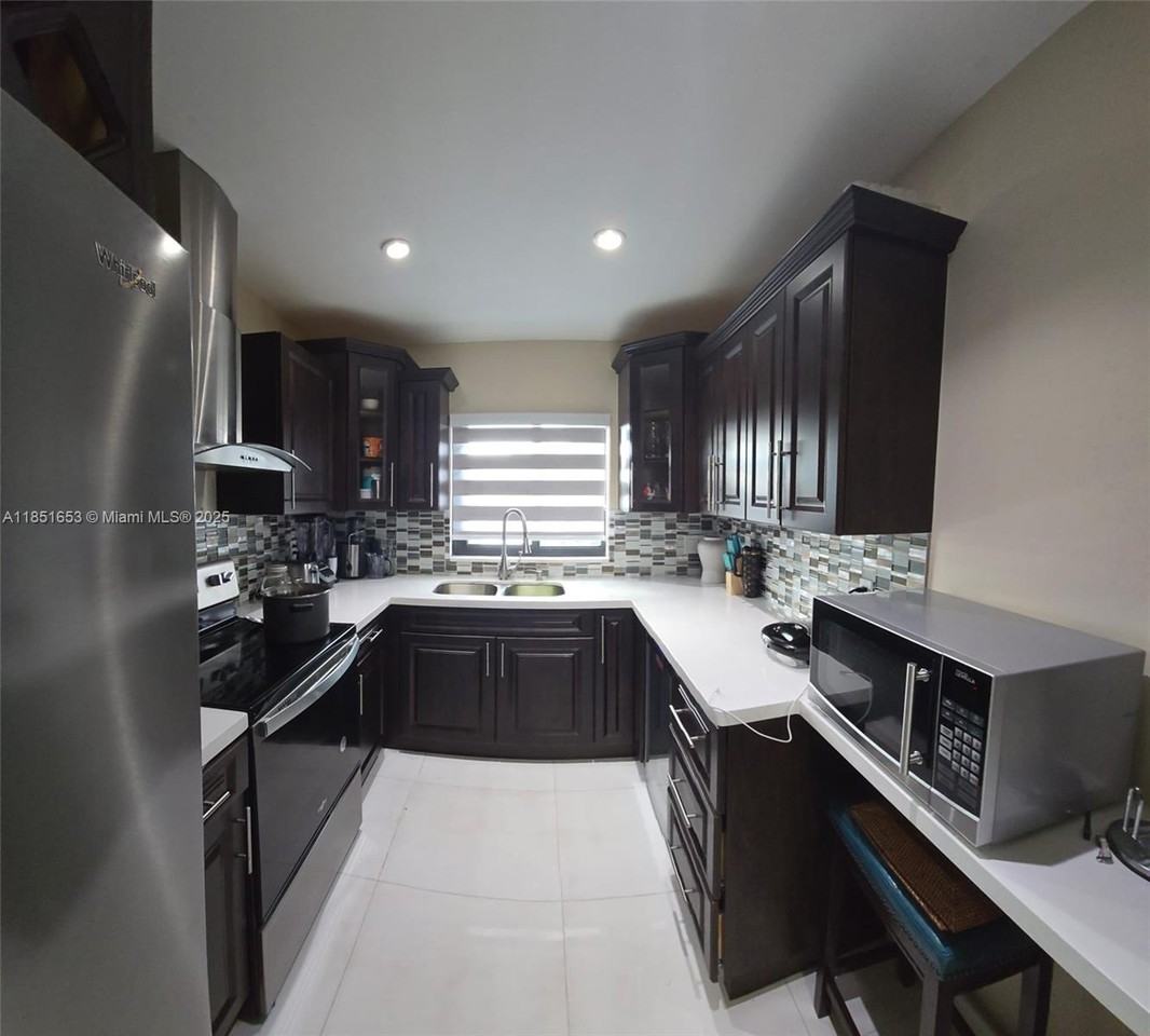 13958 Sw 44th Lane Cir #13958-614 - Photo 2 of 16