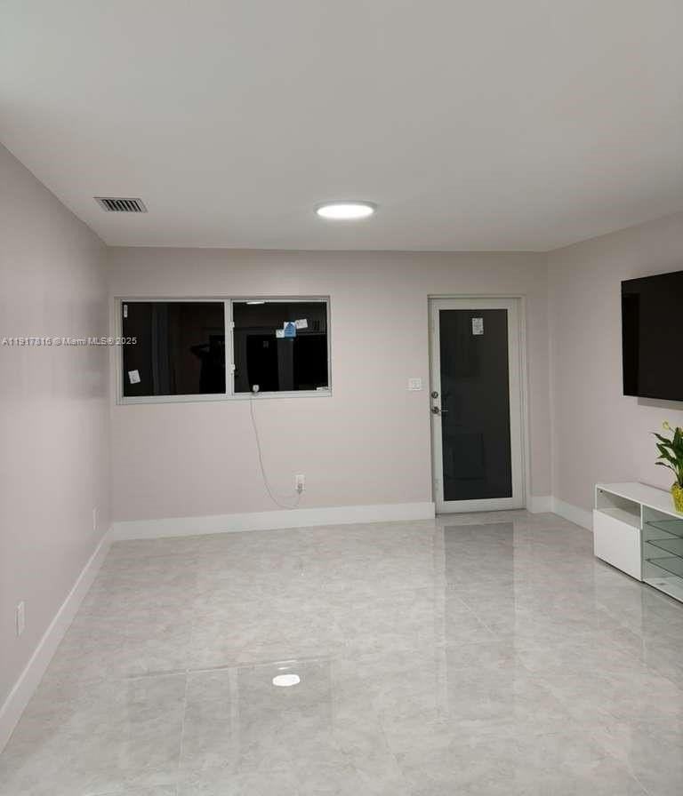 7781 Simms St - Photo 2 of 21