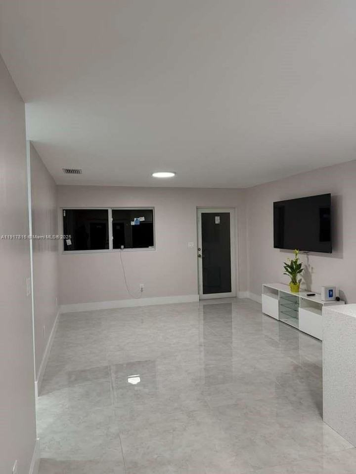 7781 Simms St - Photo 4 of 21