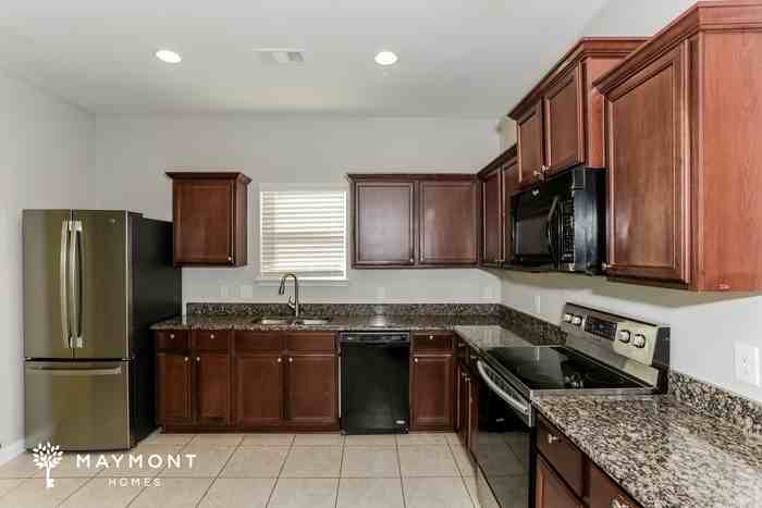 13120 Tower Ln - Photo 6 of 12