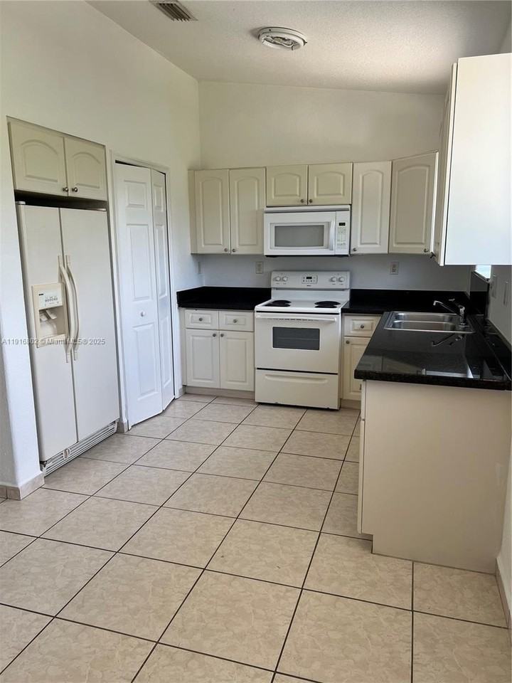 7291 Nw 174th Ter #205 - Photo 4 of 22