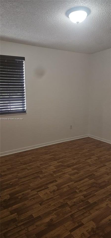 18306 Nw 68th Ave #G - Photo 6 of 14