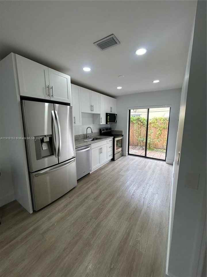 6121 Southwest 48th Court #3 - Photo 4 of 14