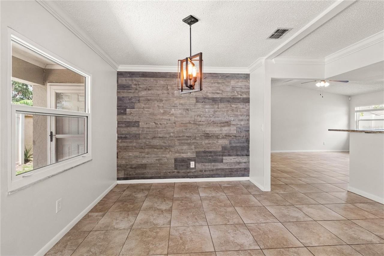 7021 Blossom Ave - Photo 5 of 25