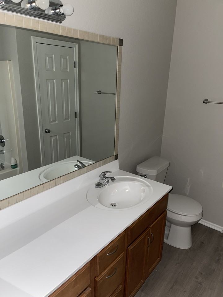 10702 N 146th East Ave - Photo 7 of 9