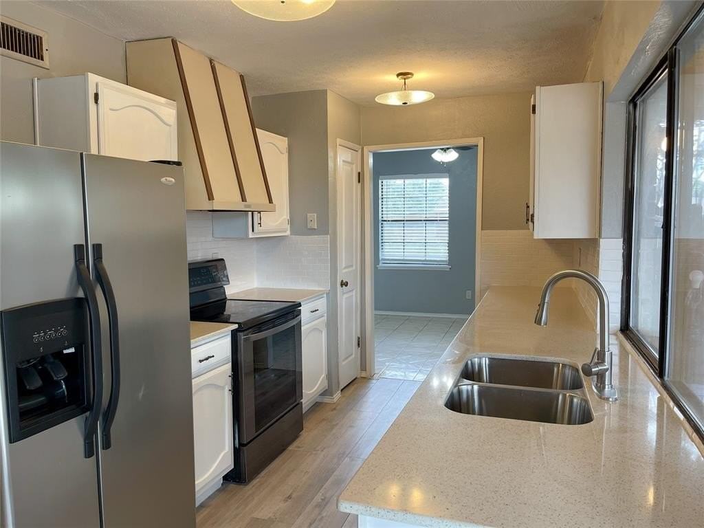 8306 Woodside Rd - Photo 3 of 14