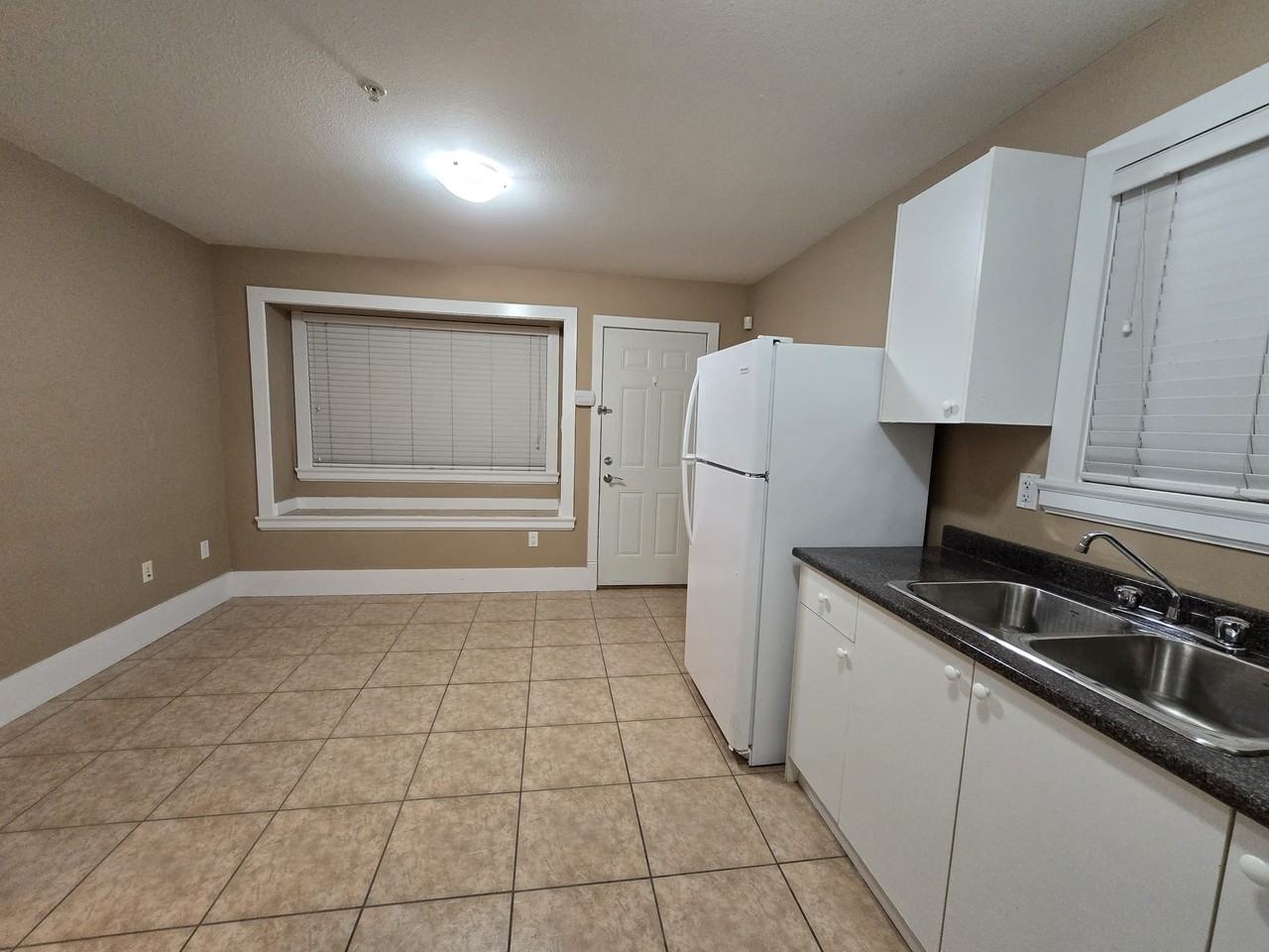 162 East 59th Avenue - Photo 2 of 5