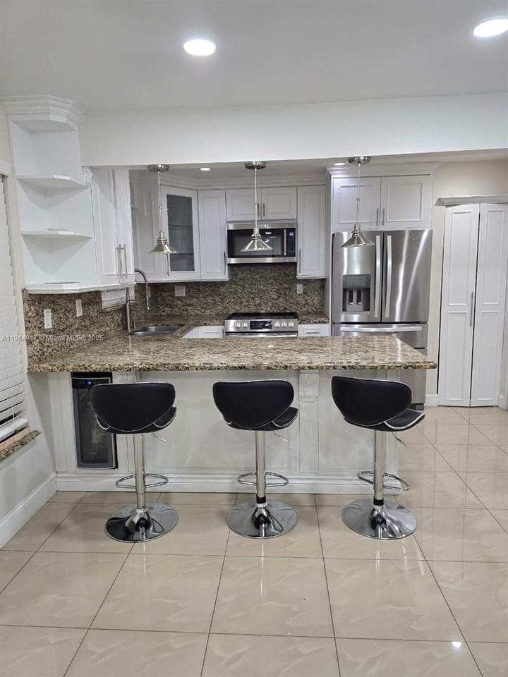 6395 Sw 136th Ct #6395110K - Photo 2 of 23