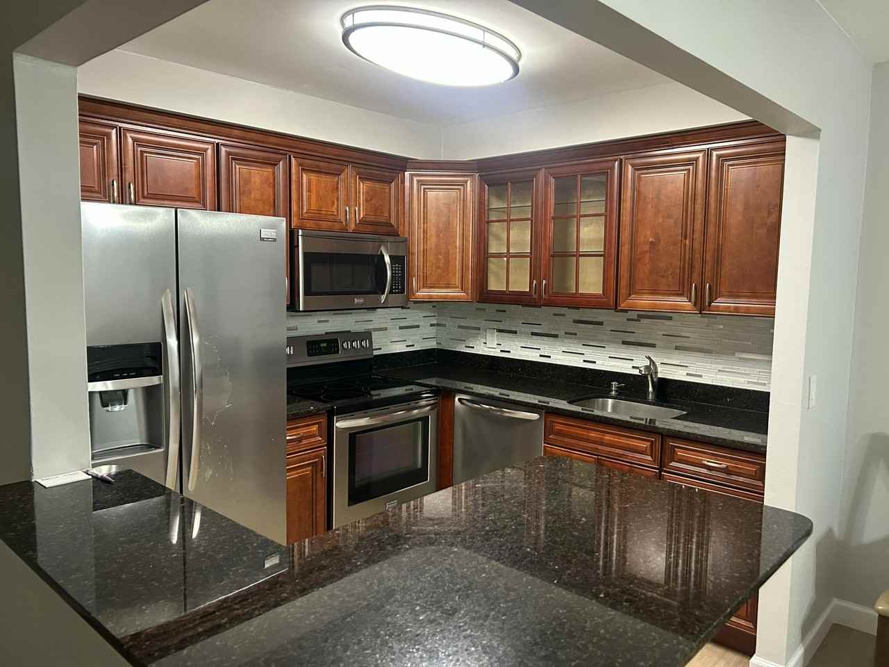 446 Brittany Dr #J - Photo 3 of 27