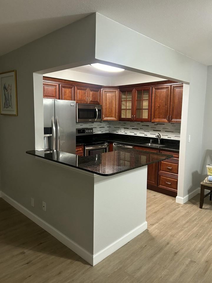 446 Brittany Dr #J - Photo 4 of 27