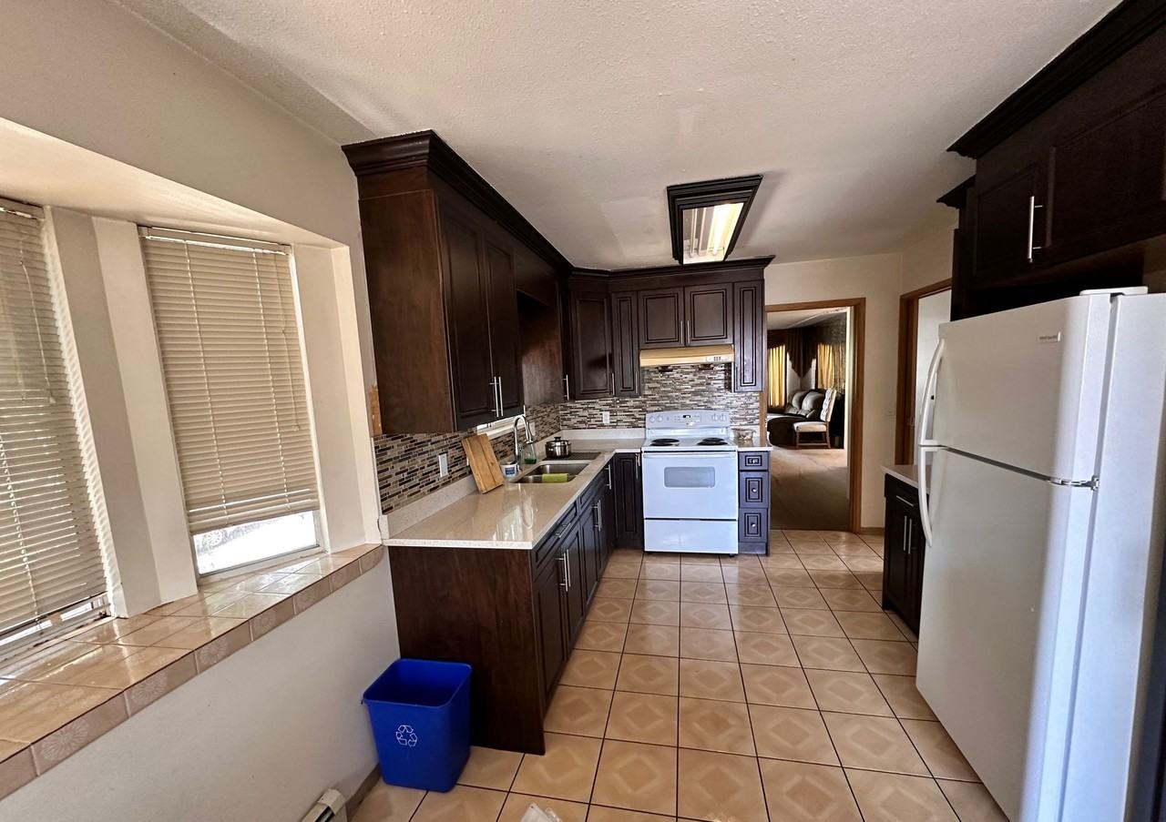 304 East 64th Avenue - Photo 4 of 13