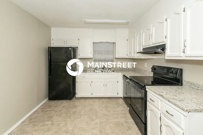 1704 Brewster Rd - Photo 4 of 15