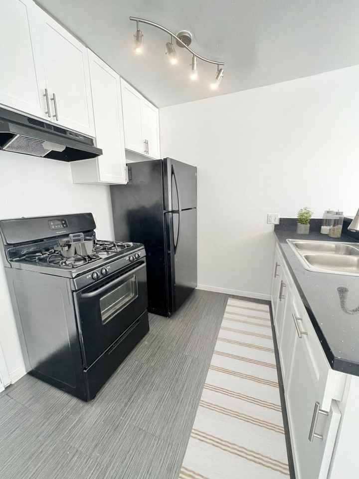 Playa Palms Apartments LLC - Photo 5 of 47