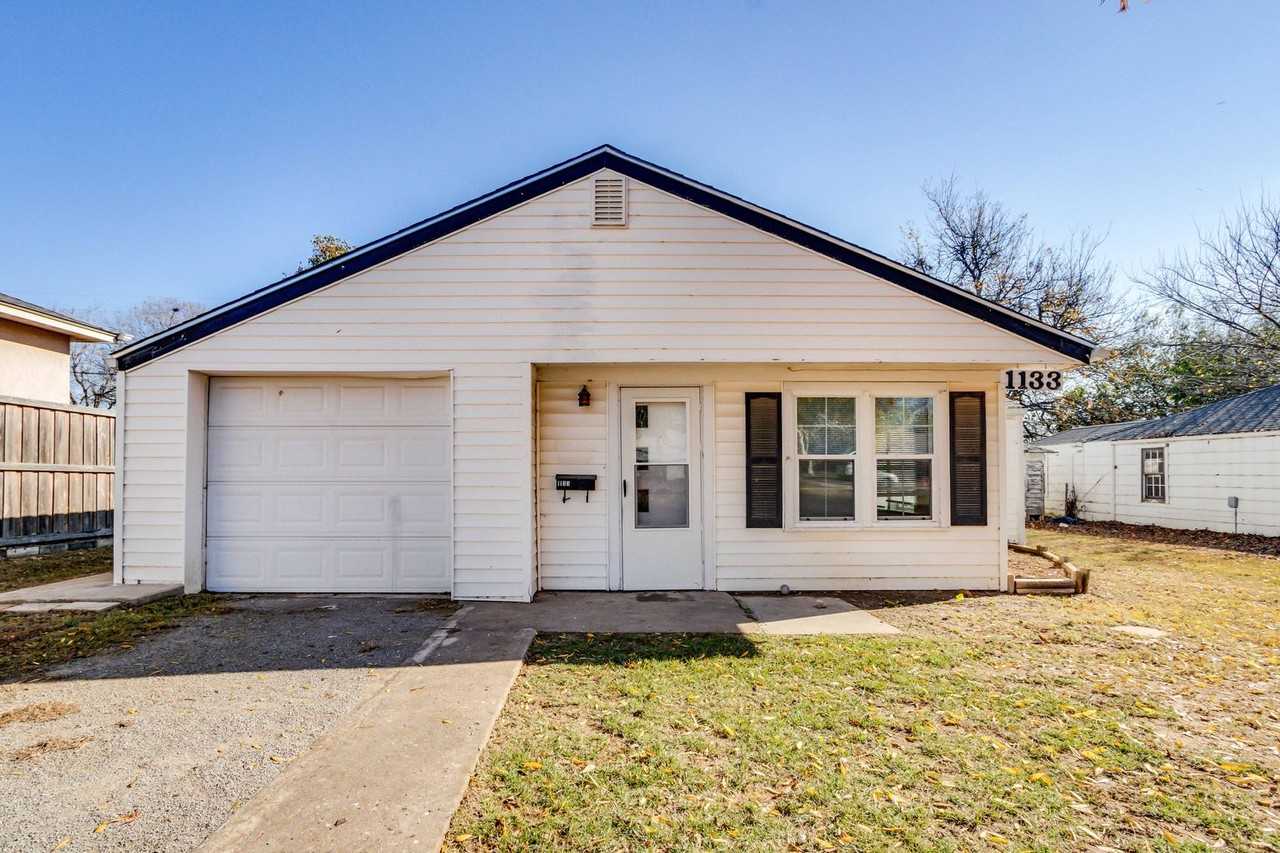 1133 S Miles Ave - Photo 6 of 44