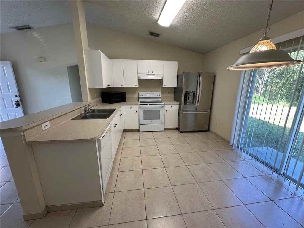 8566 99th Avenue - Photo 4 of 15