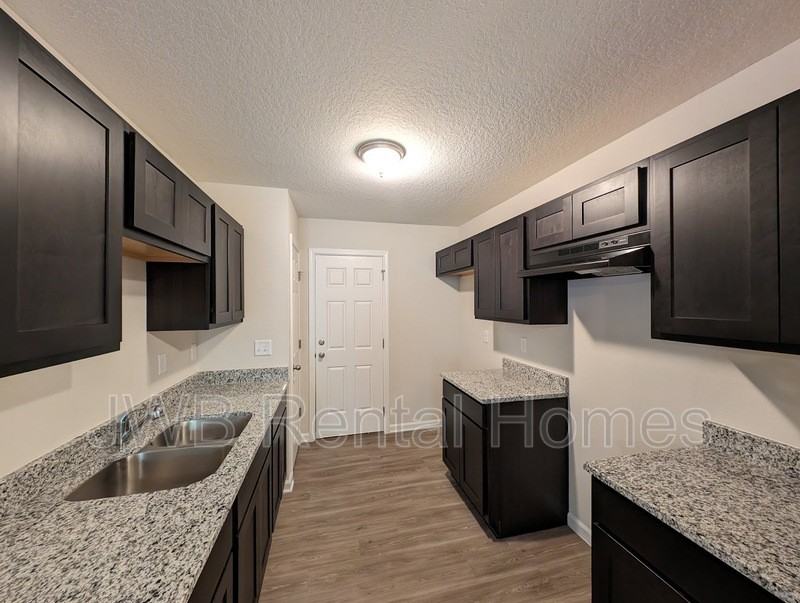 5741 Teeler Ave - Photo 3 of 9