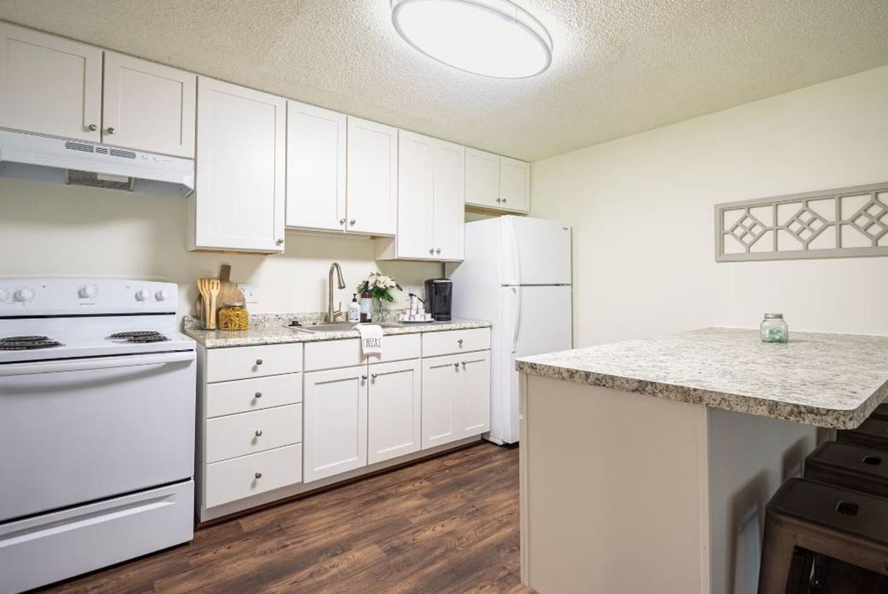 Oakbrook ~ Boutique Cottage Style Living Meets Hassle Free Leasing - Photo 2 of 12