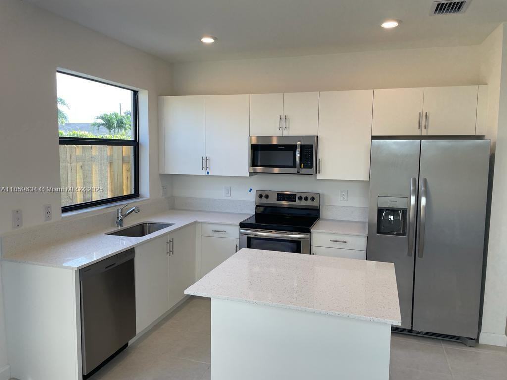 945 Northeast 211th Street - Photo 4 of 16