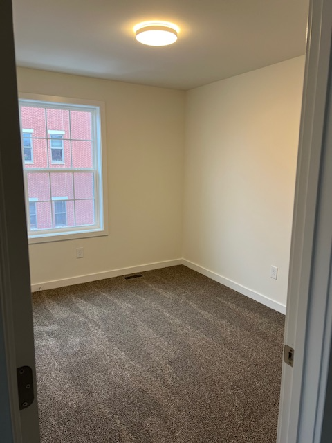 213 W 2nd St - Photo 6 of 9