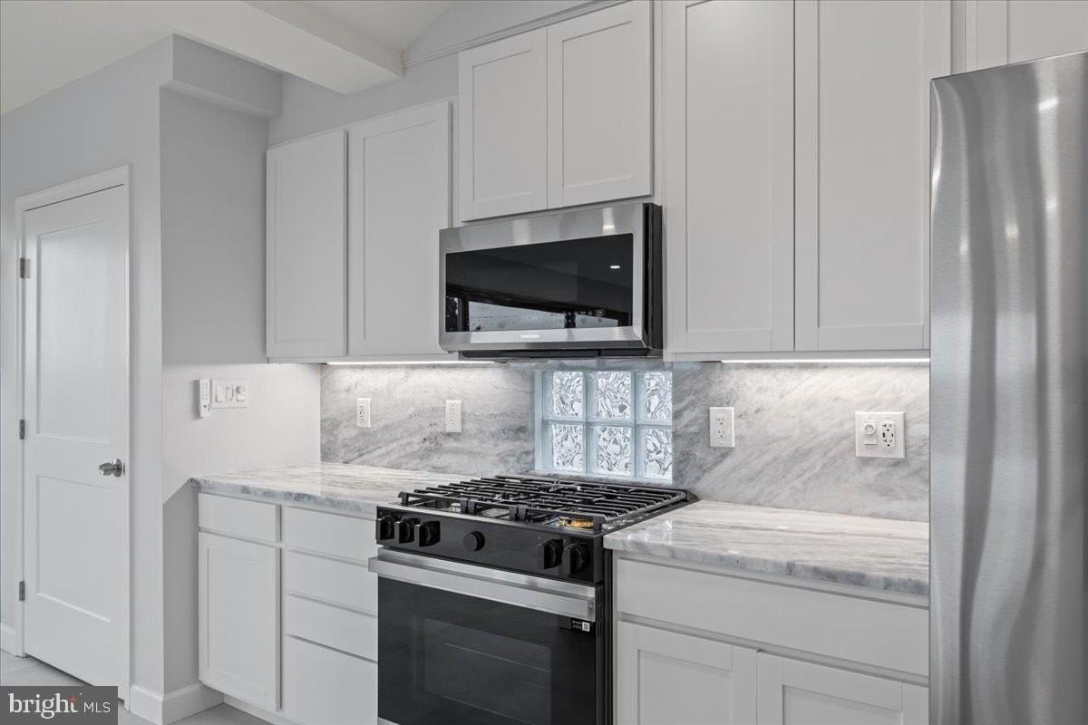 1345 Ellicott Ave - Photo 4 of 43