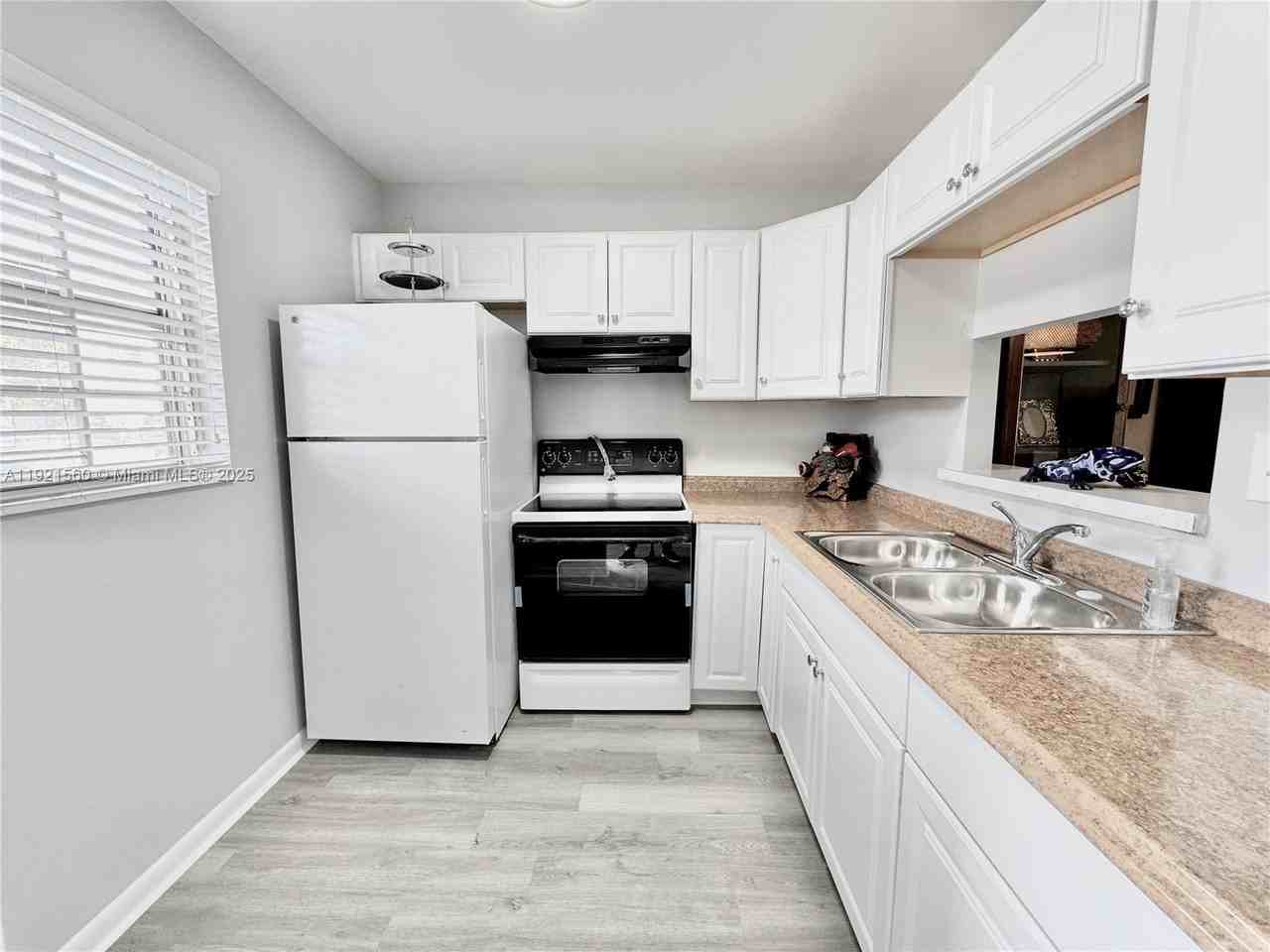 4431 Northwest 16th Street #H104 - Photo 5 of 19