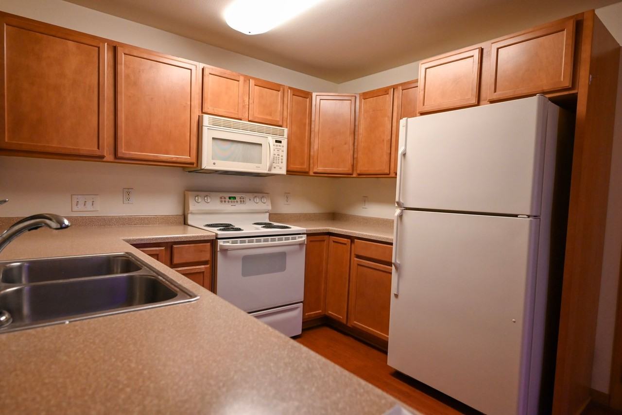 MCCOMB PLACE APARTMENTS - Photo 3 of 30