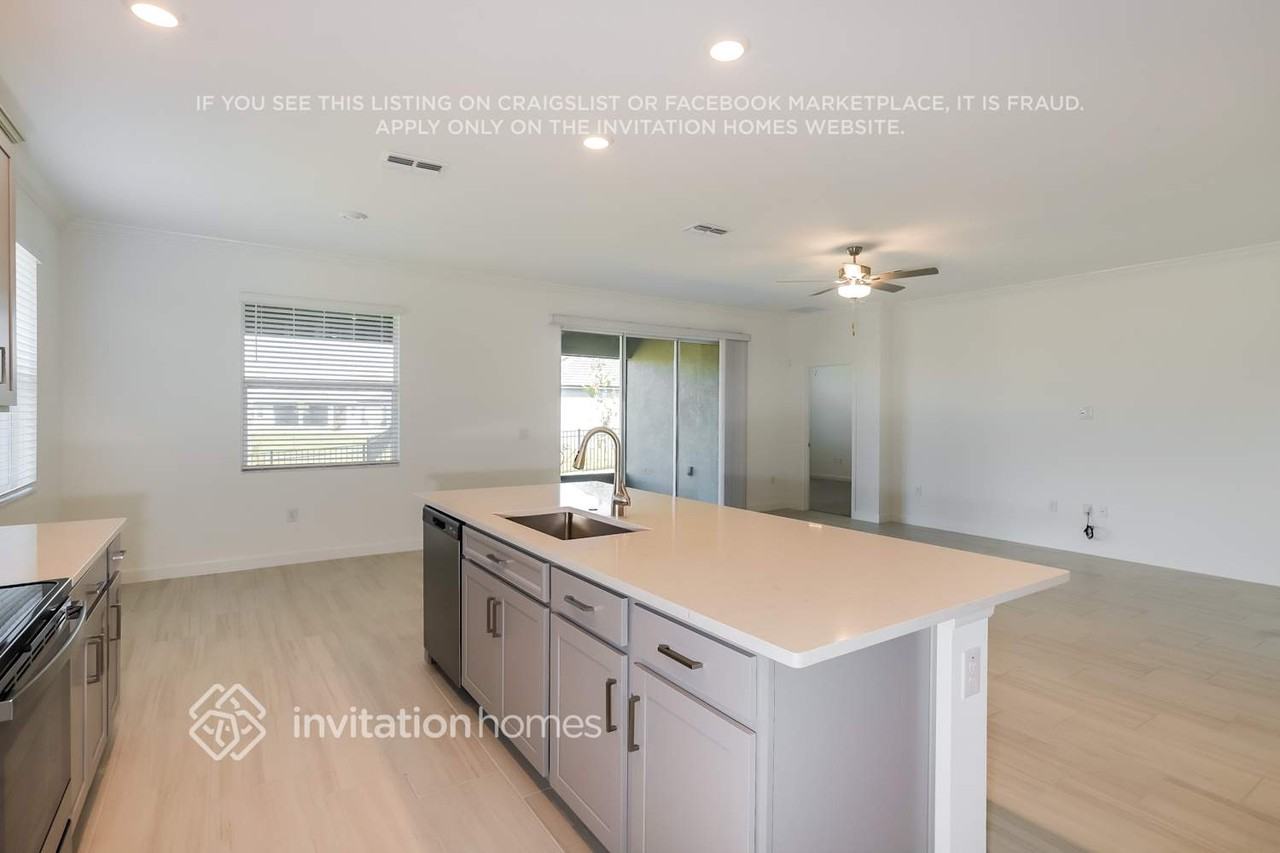 14235 20th St E - Photo 7 of 24