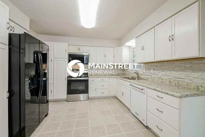 838 East 125th Terrace - Photo 6 of 19