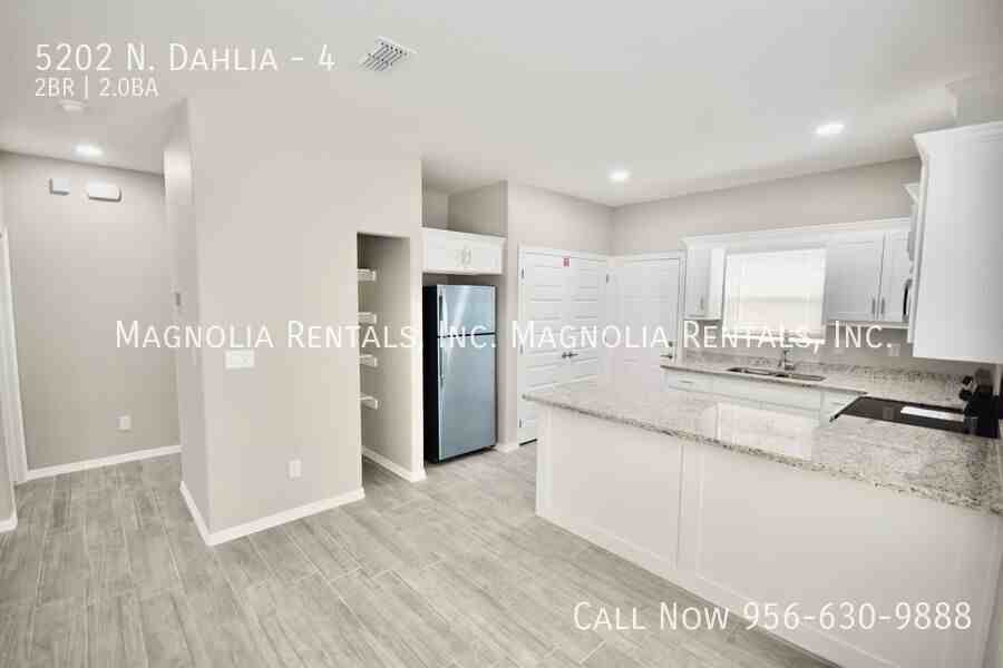 5202 N Dahlia St #4 - Photo 4 of 15