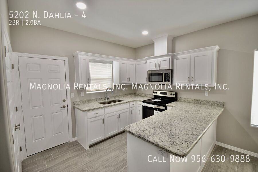 5202 N Dahlia St #4 - Photo 5 of 15