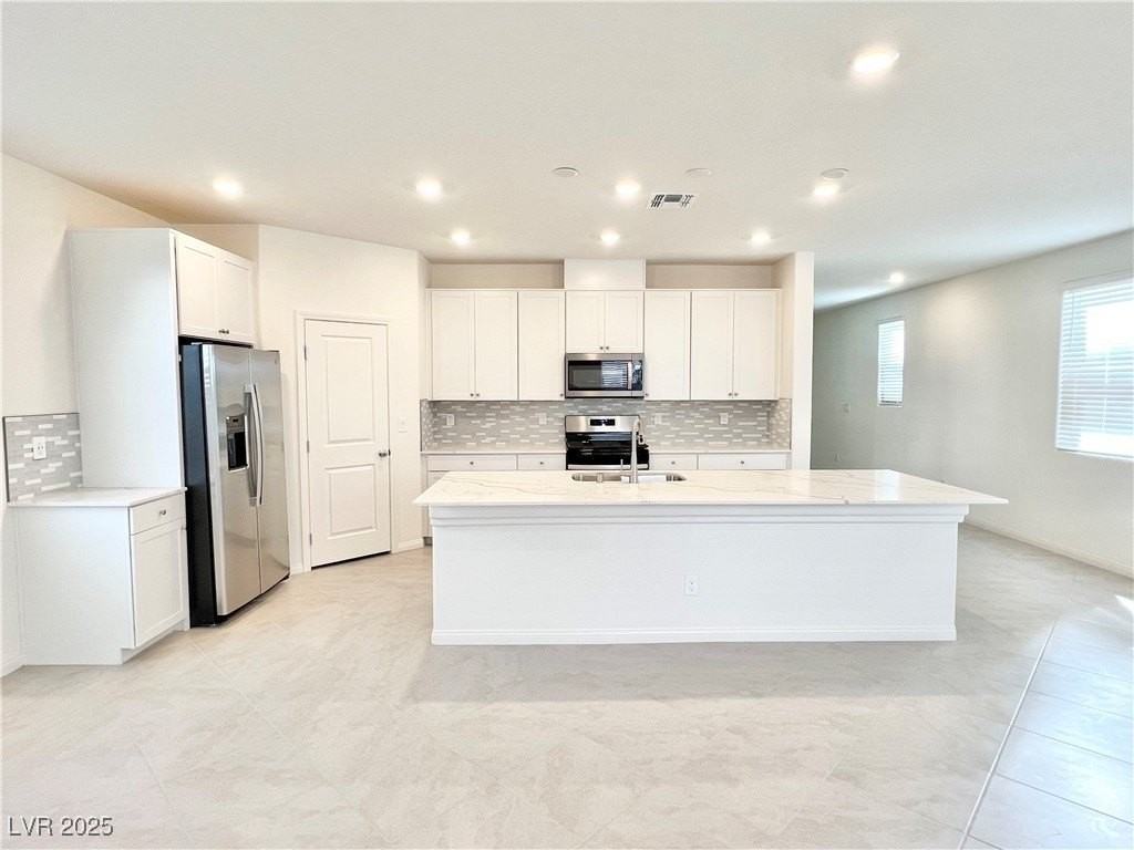 6972 West Ford Avenue - Photo 7 of 24