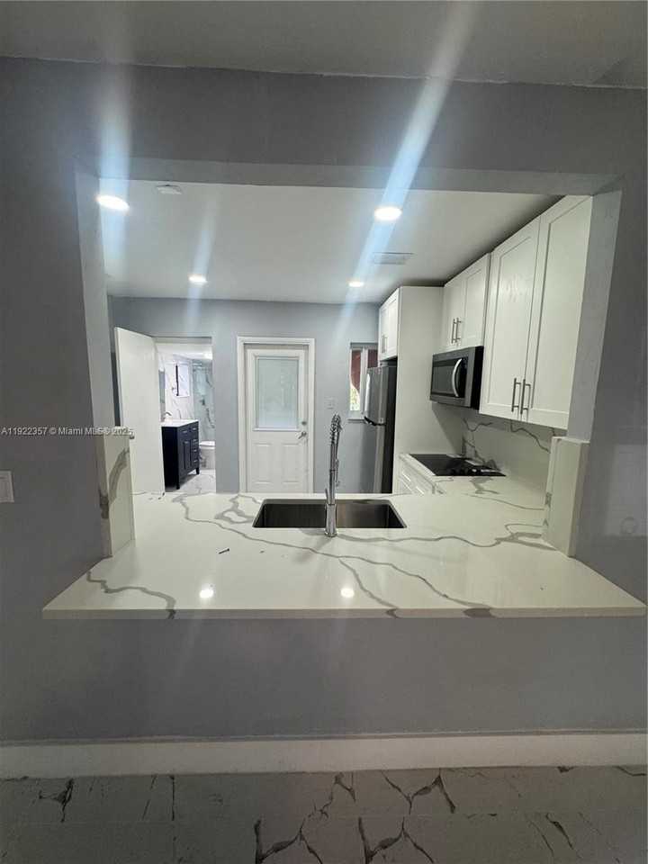 1171 Ne 161st Ter #0 - Photo 4 of 11