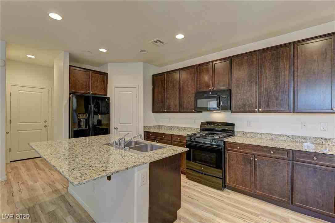 10156 Ruggles Mansion Ave - Photo 6 of 18