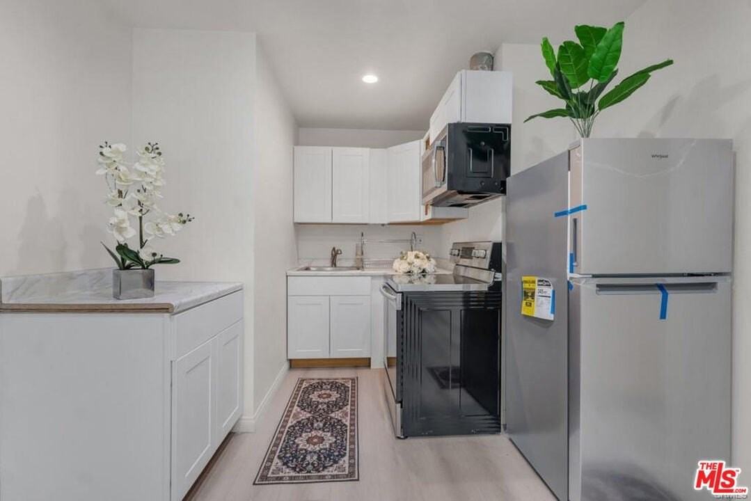 7705 Baird Ave - Photo 2 of 13