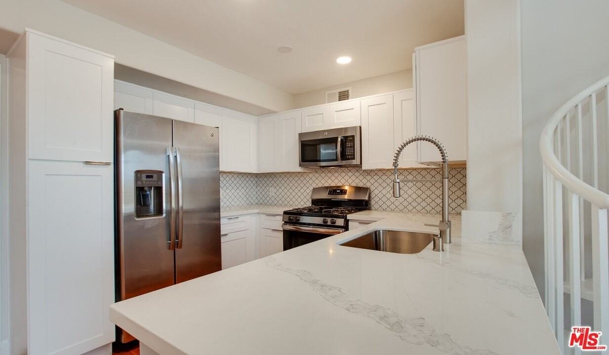 5551 W 6th St Apt 3415 #3-415 - Photo 2 of 14