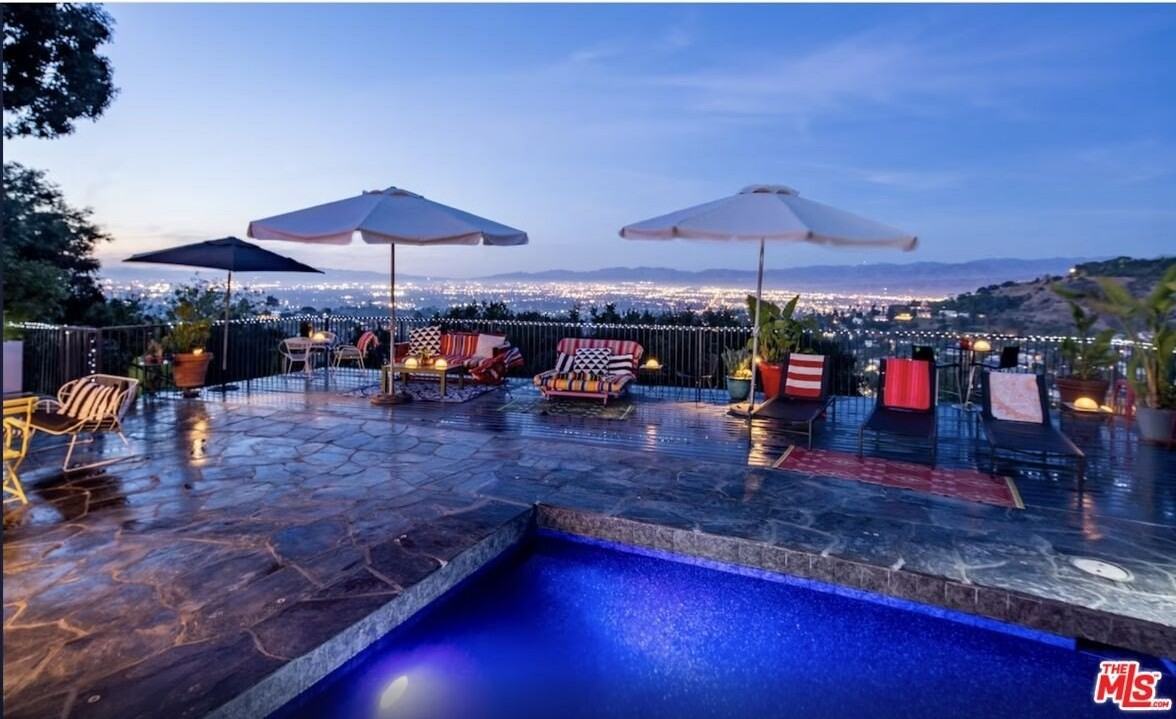 8147 Mulholland Ter - Photo 5 of 31